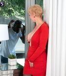 Big-titted golden-haired grandmother Seka Ebony holds a Peeping Tom’s big ebony penis in her hand